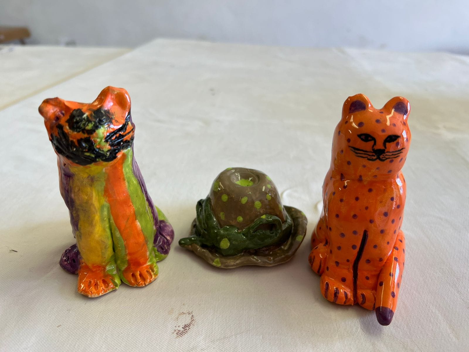 Animal sculptures made by a young student at Clay Magic pottery studio.