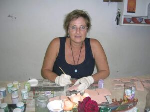 Arlene, the owner's sister, working in the Clay Magic studio and destressing while creating pottery.