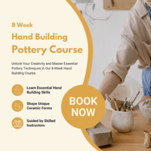 Hands shaping clay in a beginner hand-building pottery class
