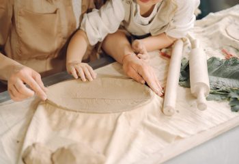 Mother and daughter working with clay Mother and daughter working with clay at Clay Magic Pottery Studio.